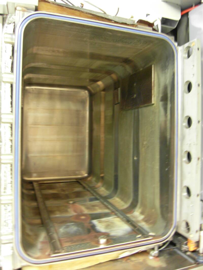 Large metal chamber with open door